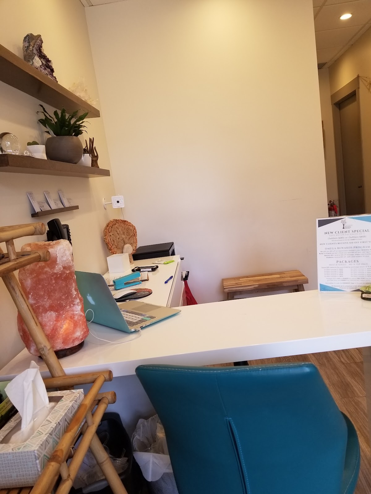 Omega Massage + Wellness